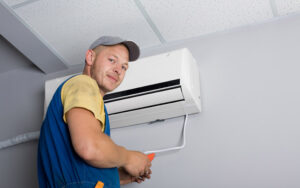 Installer Sets A New Air Conditioner